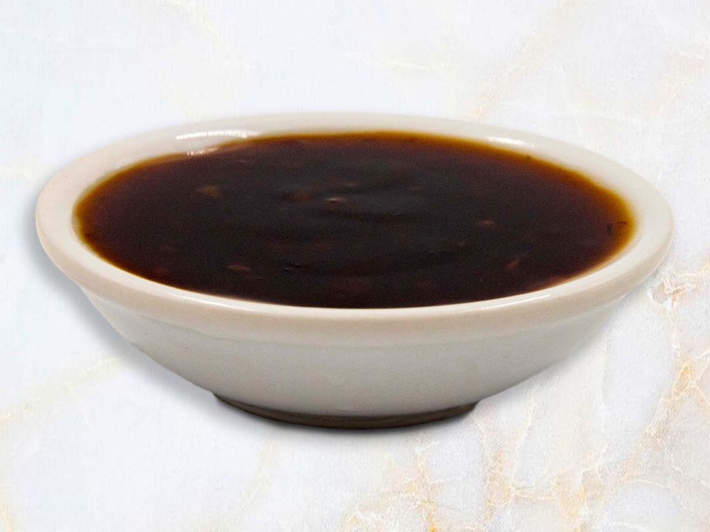 A Small Bowl of Marsala Sauce